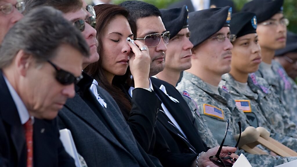 Family members and troops attend the Nov. 10, 2009, memorial service at Fort Hood, Texas, for victims of the Nov. 5 shooting.